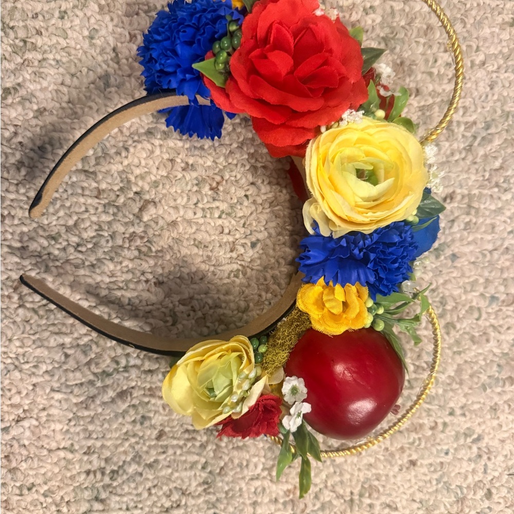 Colorful Floral Headband with Red, Yellow, and Blue Blooms